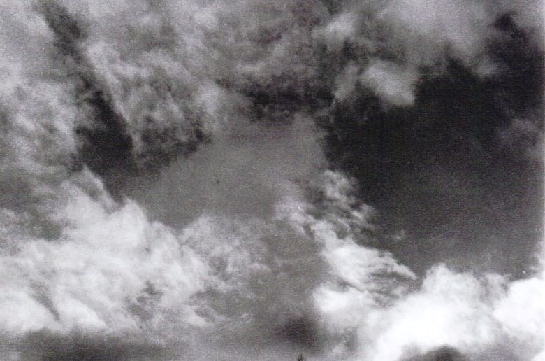 A black and white photograph of clouds.