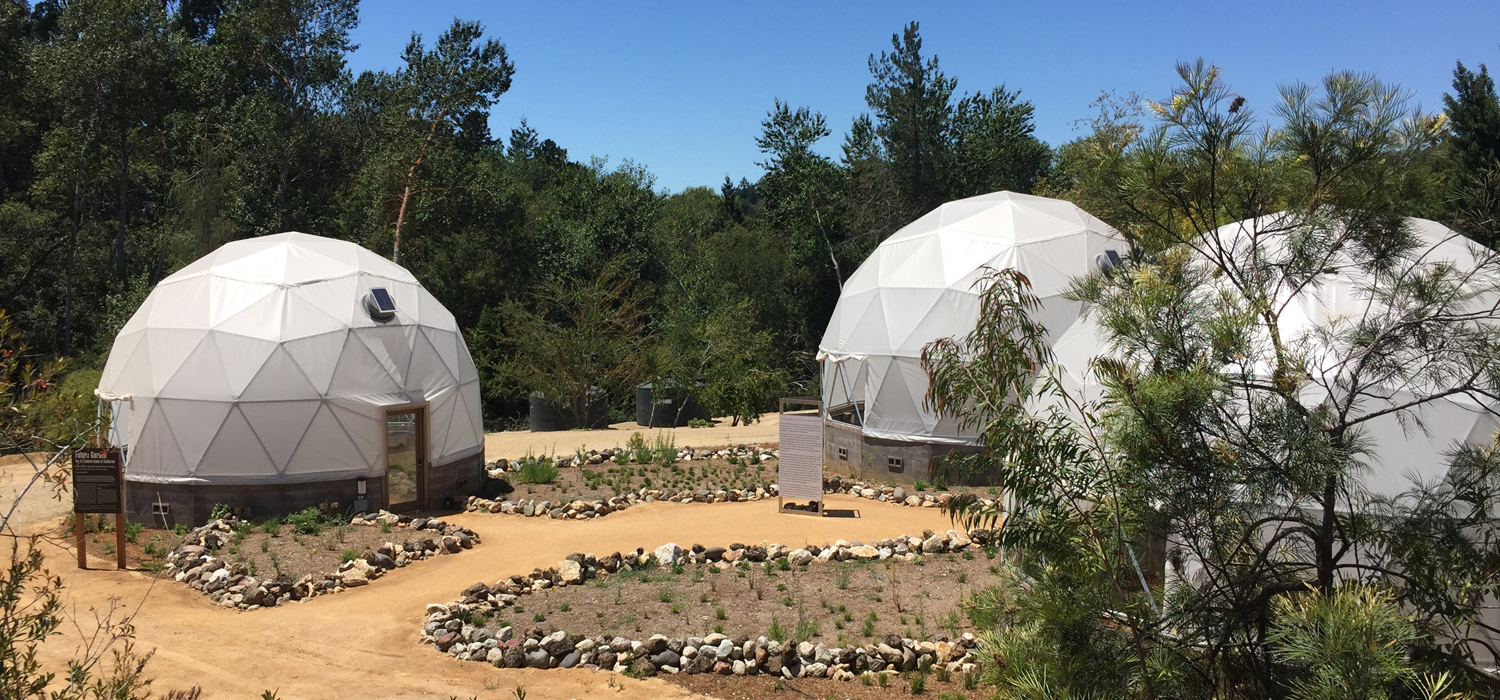 Geodesic domes sit among paths in the Future Garden.