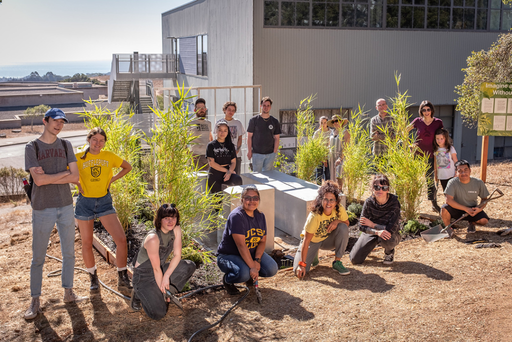 Student volunteers are pictured in the garden.