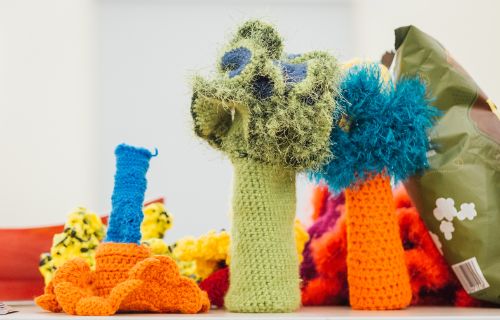 Crocheted work designed to resemble sea creatures.