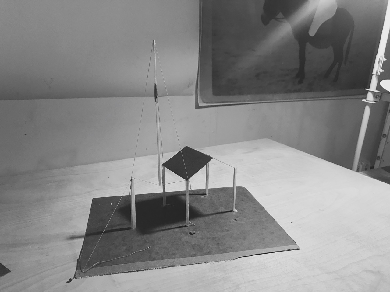 A sculpture sits on a table.