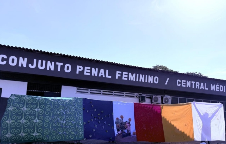 Fabric installation created in collaboration with Sisters Inside, held up outside Conjunto Penal Feminino.